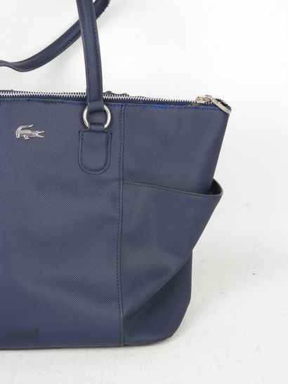 LACOSTE - Paris. Blue canvas handbag. 25...