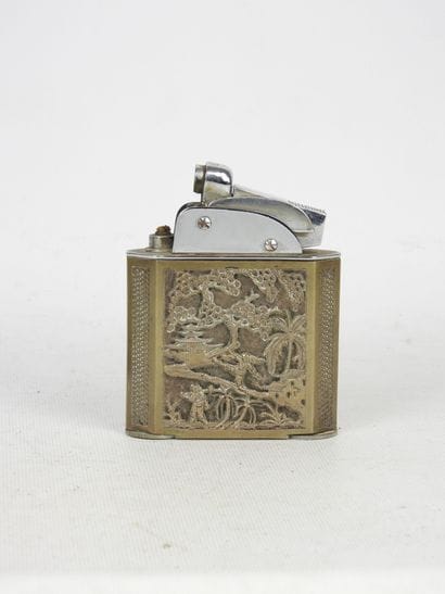 Cylindrical silver box decorated with a floral...