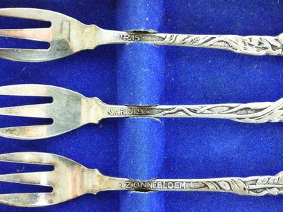 Six SMALL silver FORKS with flower design....