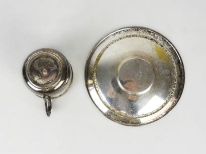 LOT in SILVER METAL including a coffee pot,...