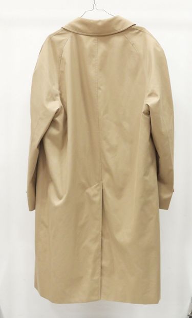 BURBERRY. Trench-coat en coton beige. Taille...