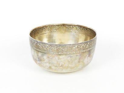 Circular silver CUP with chased floral frieze....