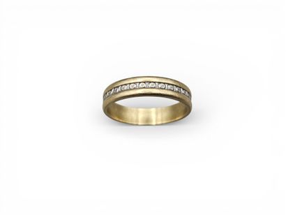 Bague anneau en or jaune et gris 750 millièmes...