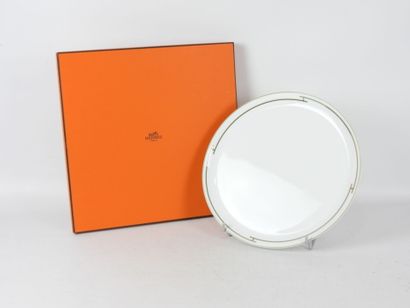 HERMES - Paris. Plat circulaire en porcelaine...