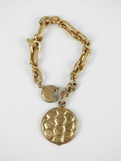 YVES SAINT LAURENT - Paris. Bracelet en métal...