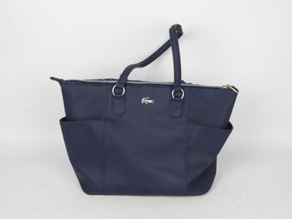 LACOSTE - Paris. Blue canvas handbag. 25...
