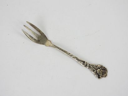 Six SMALL silver FORKS with flower design....
