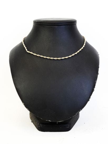 Twisted necklace in yellow and white gold,...