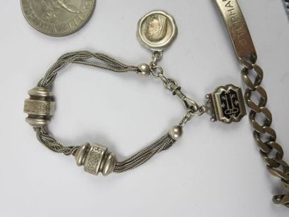 LOT in silver including chatelaine, curb...