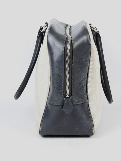 HERMES - Paris. Handbag in feather canvas...