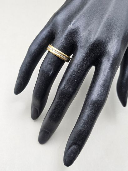 Bague anneau en or jaune et gris 750 millièmes...