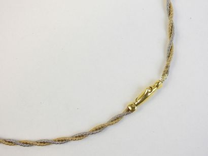 Twisted necklace in yellow and white gold,...