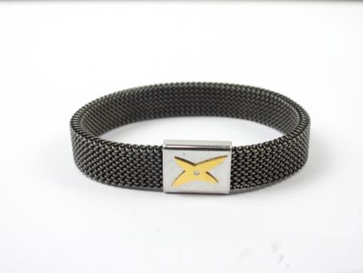 MAUBOUSSIN - Paris. Bracelet en acier noir...