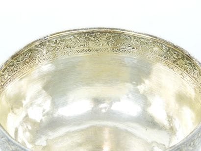 Circular silver CUP with chased floral frieze....