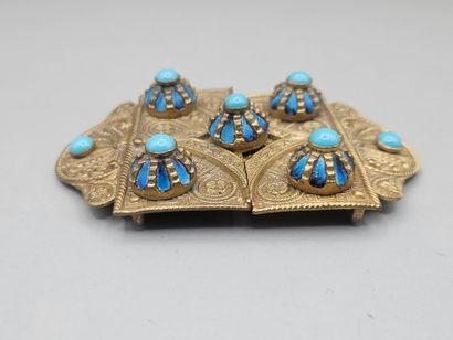 PF. 
Boucle de ceinture en laiton à motifs...