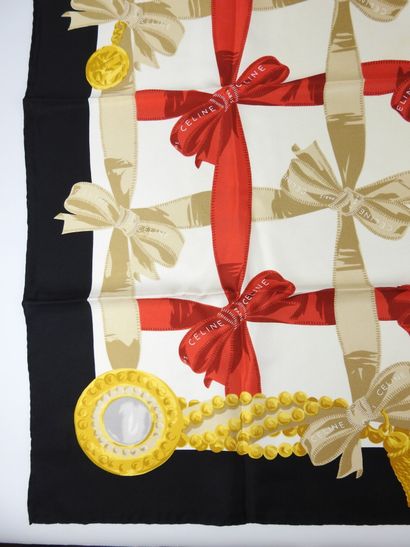 CELINE - Paris. Silk square with knot decoration....