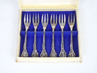 Six SMALL silver FORKS with flower design....
