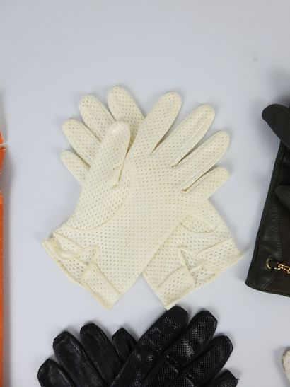 Pair of white peccary gloves. Size 6.5. Worn...