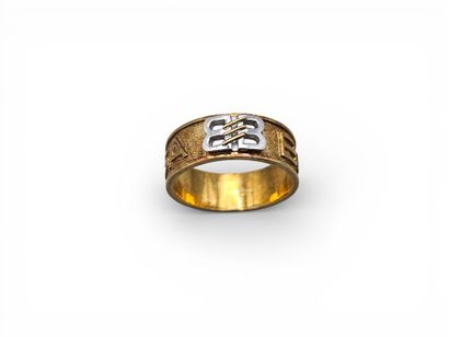 BALENCIAGA.
Bague en or jaune et gris 750...