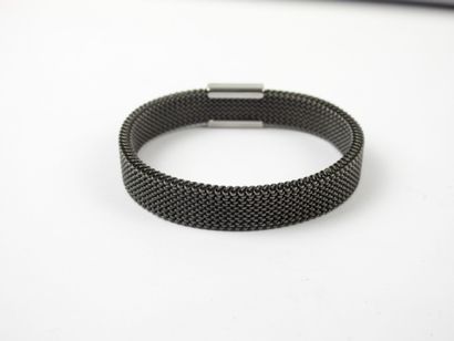 MAUBOUSSIN - Paris. Bracelet en acier noir...