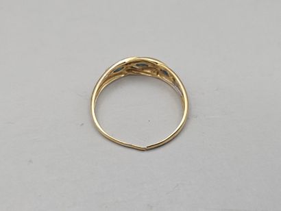 BAGUE en or jaune et gris 750 millièmes ornée...