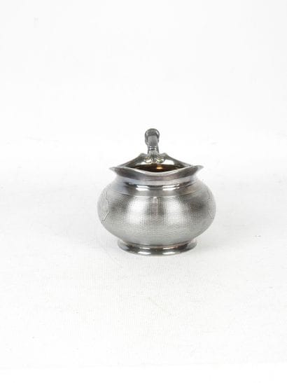 CHRISTOFLE. Silver-plated milk jug with guilloché...