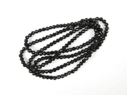 SAUTOIR NECKLACE in black pearls. L. 150...