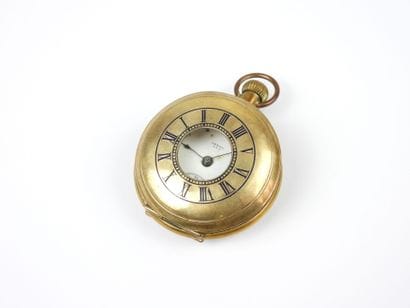 Gilt metal pocket watch IDEAL U.S.A. Attached...