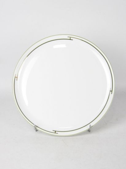 HERMES - Paris. Plat circulaire en porcelaine...