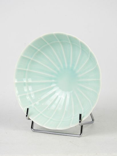 CHRISTIAN DIOR. Coupe circulaire en porcelaine...