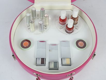 CLINIQUE. Valise de présentation de produits...