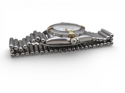 BREITLING.
Steel and gold ladies' wristwatch,...