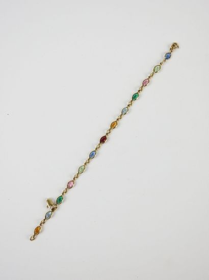 BRACELET en or jaune 750/1000° et pierres...