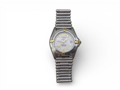 BREITLING.
Steel and gold ladies' wristwatch,...