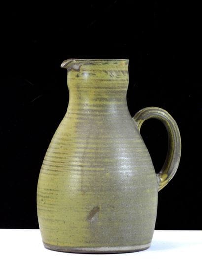 TAIZE
Large stoneware pitcher with green...