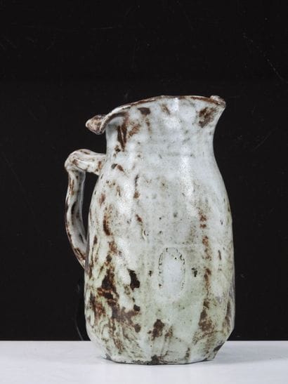 Eugène LION (1867-1945).
Stoneware pitcher...