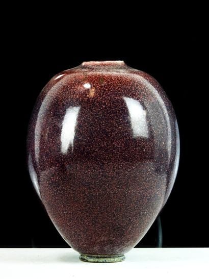Oxblood glazed ceramic ovoid vase.
Monogrammed...