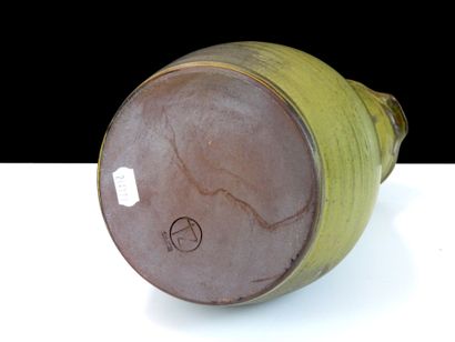 TAIZE
Large stoneware pitcher with green...