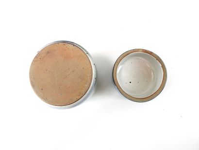 Covered cylindrical box in blue and brown...
