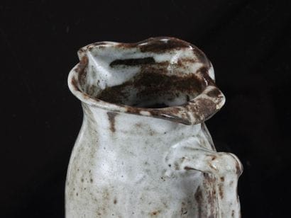 Eugène LION (1867-1945).
Stoneware pitcher...