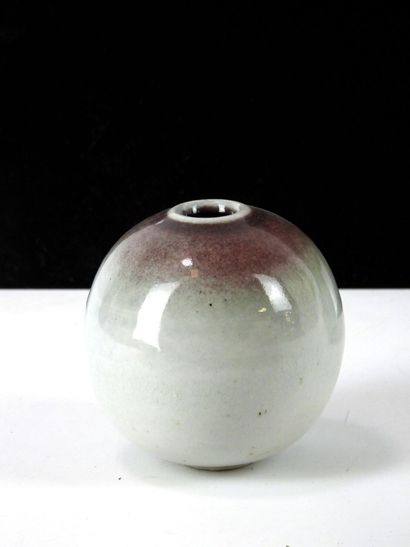 REUNION OF TWO glazed ceramic ball vases...
