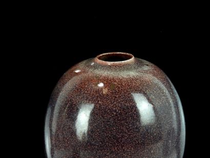 Oxblood glazed ceramic ovoid vase.
Monogrammed...