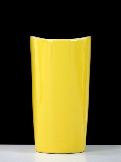 Glazed ceramic vase with yellow glaze and...