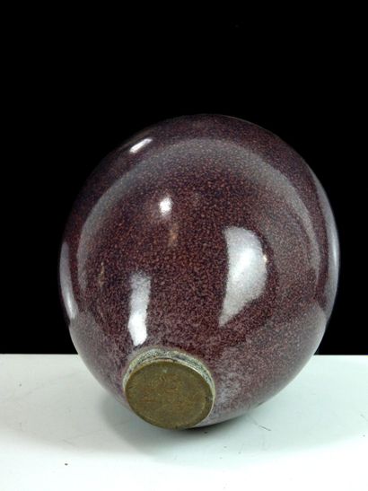 Oxblood glazed ceramic ovoid vase.
Monogrammed...