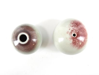 REUNION OF TWO glazed ceramic ball vases...