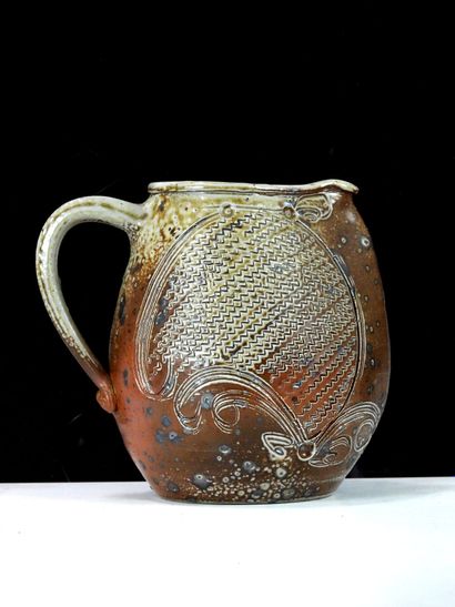 Stoneware PICHET with brown glaze and stylized...