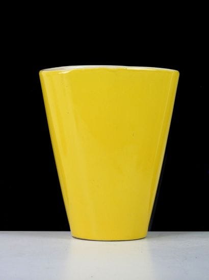 Glazed ceramic vase with yellow glaze and...