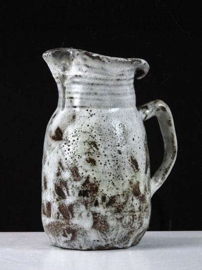 Eugène LION (1867-1945).
Stoneware pitcher...