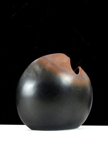 VIREBENT. 
Lenticular vase with offset neck...