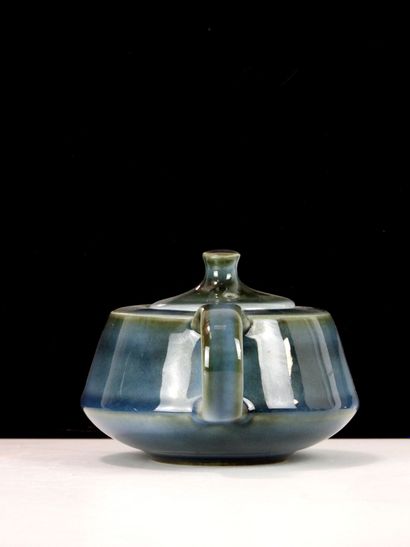 VIREBENT. 
Two small teapots in blue enameled...